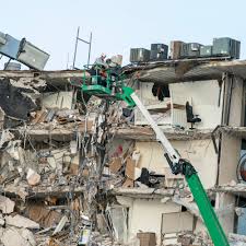 A partially collapsed building is seen early thursday in the surfside area of miami, fla. Nuvcl4e7ehfksm