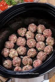 Meatballs, chili sauce, grape jelly. Crockpot Meatballs Spend With Pennies