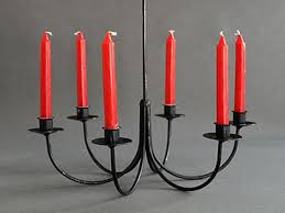 If you're crafty, you can modify your ceiling fans with medium bases for larger bulbs (if there is enough space, of course). Wrought Iron Candle Chandelier Ideas On Foter