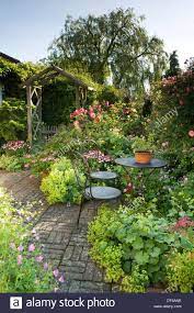 Found On Bing From Www Alamy Com Cottage Garden Borders Cottage Garden Backyard Landscaping
