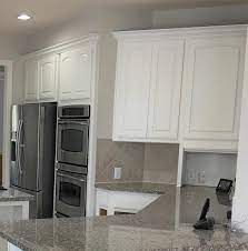 The average cost to paint kitchen cabinets white is $3 to $10 per square foot or $30 to $60 per linear foot of cabinetry depending on the condition of the cabinets, the painting method, and labor costs. 5 Tips Painting Dark Kitchen Cabinets White And The Mistakes I Made