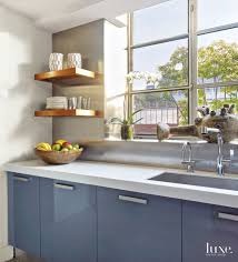 Nitrocellulose lacquers were used for decades for kitchen cabinets and bathroom vanities. Transitional Neutral Kitchen Blue Lacquered Cabinetry Luxe Interiors Design