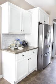 You'll also need a significant amount of space to lay out your cabinet doors for sanding, priming, painting, and drying in between. How To Paint Kitchen Cabinets Like A Pro Bless Er House