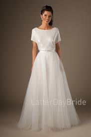Ursa And Pandora Step Into A Summer Garden In This Airy Ethereal Wedding Gown With Images Cheap Modest Wedding Dresses Modest Wedding Dresses Lds Modest Wedding Dresses