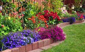 Try color coordinating the vertical garden with. Flower Bed Ideas For Front Of House