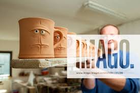 Bernd the bread cup master potter Edgar Lehmann with a board full of Bernd  the bread