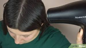 How to fix frizzy hair after blow drying. 3 Ways To Blow Dry Hair Without Frizz Wikihow