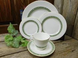 The bowl of the spoon faces the forks and is always on top of the fork when placed horizontally on top of the place setting. New Old Stock Royal Doulton Rondelay 5 Piece Place Setting Etsy Royal Doulton Place Settings Dinner Plates