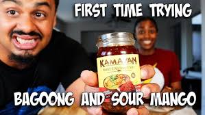 White girl eating bagoong