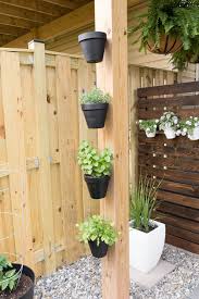 How To Hang Flower Pots Hanging Flower Pots On A Fence Small Backyard Landscaping Small Garden Design Flower Pots Outdoor