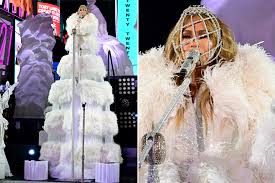 The singer and actor celebrated biden being sworn in as the 46th president of the united states, along with fellow artist lady gaga. Jennifer Lopez Dons Wild Face Mask For New Year S Eve Performance
