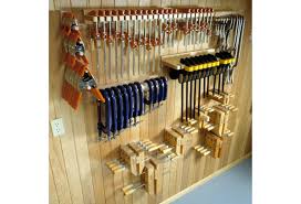 Pipe clamps are heavy and cumbersome, which makes them difficult to store, but in a couple hours you can build this simple rack that will keep your clamps off the floor and within easy reach. 5 Great Clamp Organizers