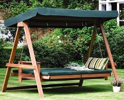 29 Hanging Bed Design Ideas To Swing In The Good Times Outdoor Hanging Bed Outdoor Bed Swing Backyard Seating