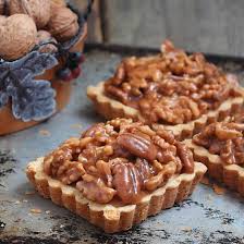 Mini Nuts Pies Tartelettes A French Style Tarte Aux Noix Is Filled With Frangipane Salted Caramel And Nuts In F Almond Butter Recipes Food Sweet Recipes