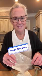 Poppy Seed Cake 1 box Duncan Hines Golden Butter cake mix 3/4 c. vegetable  or canola oil 4 eggs 1/4 c. water 1/2 c. sour cream 1/4 c. poppy seeds Mix  all ingredients together except poppy seeds; ...