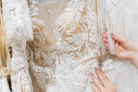 It lasts long and adheres to any akin area (face, elbows, knees, malleolus, armpits, etc) without stickiness. Bride Touches Luxurious White Cream Wedding Dress On Hangers Stock Photo Picture And Royalty Free Image Image 148069688