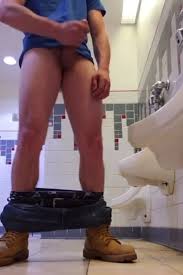 Jerking off at the urinal: caught in the public toilet