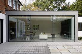 They are also a highly efficient way to gain access to an the quickest and easiest choice to cover your sliding patio door is curtains. Exterior View Of Minimal Windows To Rear Extension In London Showcasing Their Minimal Framing Anbau Haus Haus Erweiterungen Anbau Gartenhaus