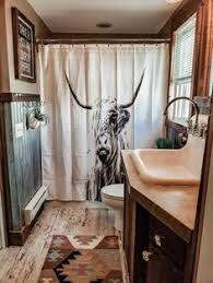 All of these items are widely available in rustic, country western themes, featuring sculptures or images of flora and fauna, ranchscapes, cowboys and other iconic symbols of country life. 220 Best Cowboy Bathroom Ideas In 2021 Rustic House Bathroom Decor Cowboy Bathroom
