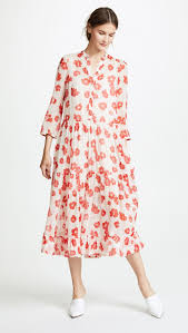 How Women In 6 Different Countries Wear The Same Perfect Dress Dresses Fashion Loose Midi Dress