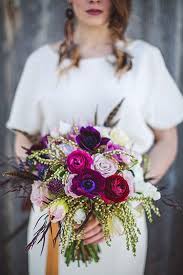 An unusual combination of vanilla orchids and hydrangea blooms on top and passion. Magenta Purple Bouquet Purple Wedding Bouquets Wedding Bouquets Pink Wedding Bouquets