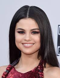 This isn't a very dark blue, so it's more noticeable. Selena Gomez Wears Hazel Contacts On The 2015 American Music Awards Red Carpet Glamour