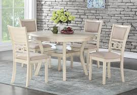 This traditional pedestal table is 36 in. New Classic Gia Cream Round Table With Four Chairs