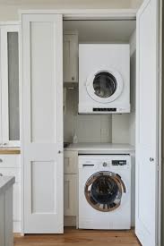 Cabinets can fully hide your washer and dryer in any kitchen or laundry room so that they're completely out of sight. Laundry Ideas How To Hide One In The Kitchen The Interiors Addict
