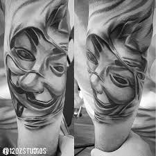 This piece is for people who are bold enough to ink daring tattoos. Awesome Detailed Realistic Black And Grey Guy Fawkes Mask V For Vendetta Tattoo By Kevin Soto Tattoo For Son Tattoos Vendetta Tattoo