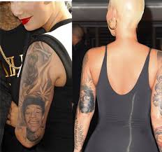 Wiz khalifa's tattoos that you can filter by style, body part and size, and order by date or score. Amber Rose Has Finally Gotten Rid Of Wiz Khalifa Tattoo See What She Replaced It With Mzurii Com