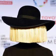 Sia Reveals The Unexpected Reason Behind Her Wigs Hair Photography Black And White Wig Wigs