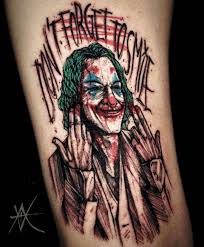 8.joker tattoo face design on leg. The Best Tattoos With Joaquin Phoenix S Joker