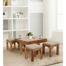 (coffee tables) while any small and low table can be, and is, called a coffee table, the term is applied particularly to the sets of three or four tables made from about 1790 (stool) lure with a stool, as of wild fowl. Brown Sheesham Wood Tyson Coffee Table With Four Stools By Trendsbee Id 20711900988