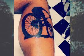 15 good bad and bold tattoos for anyone who s happiest on a mountain bike mpora mountain bike tattoo bike tattoos bicycle tattoo