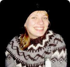 blue cowichan sweater in the woods