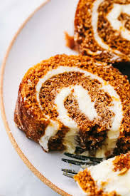 This Is The World S Best Pumpkin Roll It Is A Perfectly Moist And Tender Thin Pumpkin Cake That Gets Rolled Pumpkin Roll Pumpkin Rolls Recipe Pumpkin Recipes
