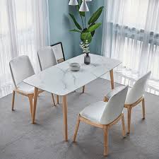 The four side chairs have a cross back design, adding flair to this stunning set. China Custom Luxury Modern New Design Cheap Large Furniture Dining Table Set China Dining Table Set Dining Table