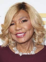 Traci Braxton 2025: Husband, net worth, tattoos, smoking & body  measurements