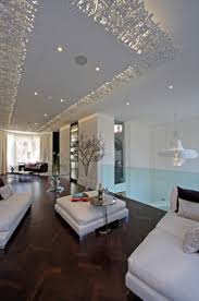 A successful lighting design combines a number of light sources at different levels of the room. False Ceiling Lighting Photos Designs Ideas