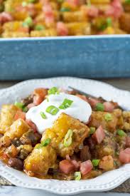Add corn, beans, canned chilis and salsa to the top of the beef (quantities as desired) and bake for an additional 10 minutes of cooking time to account for the increased volume of food. Cheesy Delicious Taco Tater Tot Casserole Adventures Of Mel