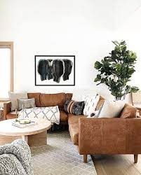 Brown couch living room decor and decorating around a brown leather sofa is a perfect excuse for more elegant decor. 5 Ways To Decorate With A Brown Sofa Daily Dream Decor