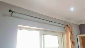So, instead of buying bay window curtain poles, you can buy a soft patterned fabric screens when used in a proper way can turn out to be an attractive part of bay window dressing. How To Put Up A Curtain Pole Batten With Grab Adhesive The Carpenter S Daughter