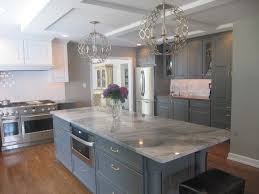 Super White Granite Fantasy Quartzite Or Super White Quartzite With Battlesh Kitchen Remodel Countertops Kitchen Cabinets Grey And White Contemporary Kitchen