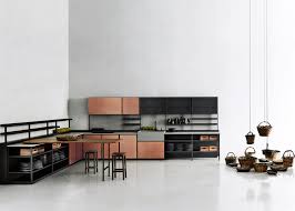 Boffi's modern approach to kitchen unit manufacturing and design incorporates glass, gloss and matte, over painted wood, to give a contemporary finish. Patricia Urquiola S Salinas Kitchen For Boffi