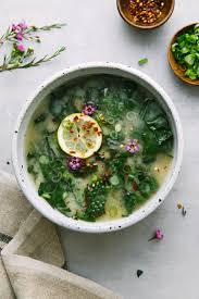 Roasted Garlic Miso Soup With Greens Features The Mellow Roasted Garlic Flavor With Umami Miso And Kale The King O In 2020 Roasted Garlic Miso Soup Vegan Soup Recipes