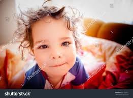 Shaggy Child Peeks Into Camera Lens Stock Photo 601182827