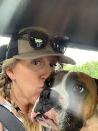 Two puppies exhausted from a family cookout