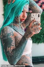 Is body modification body positive? Amber Luke Shares Never Before Seen Picture Before Spending 120k On Body Modifications And Tattoos Daily Mail Online