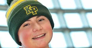 King Philip student sells hats for a good cause