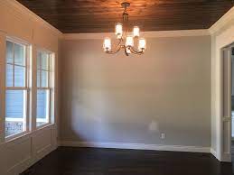 Dining Room With Bac Dark Oak Tongue And Groove Stained Wood Ceiling And Benjamin Moore White Do Stained Ceiling Stained Wood Ceiling Tongue And Groove Ceiling